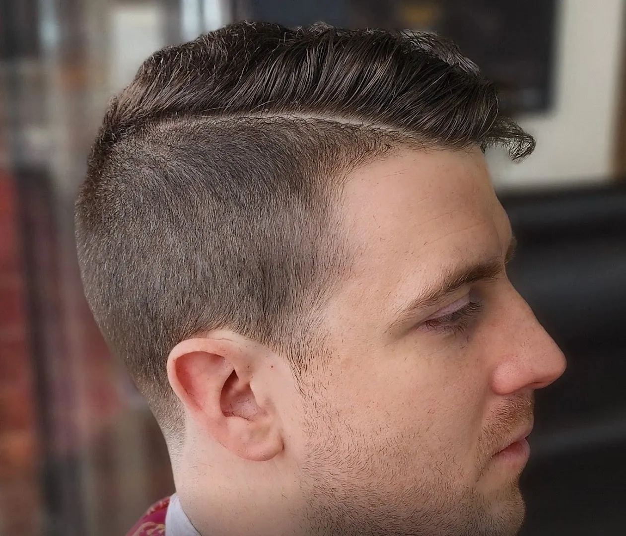 Side part with sharp razor line