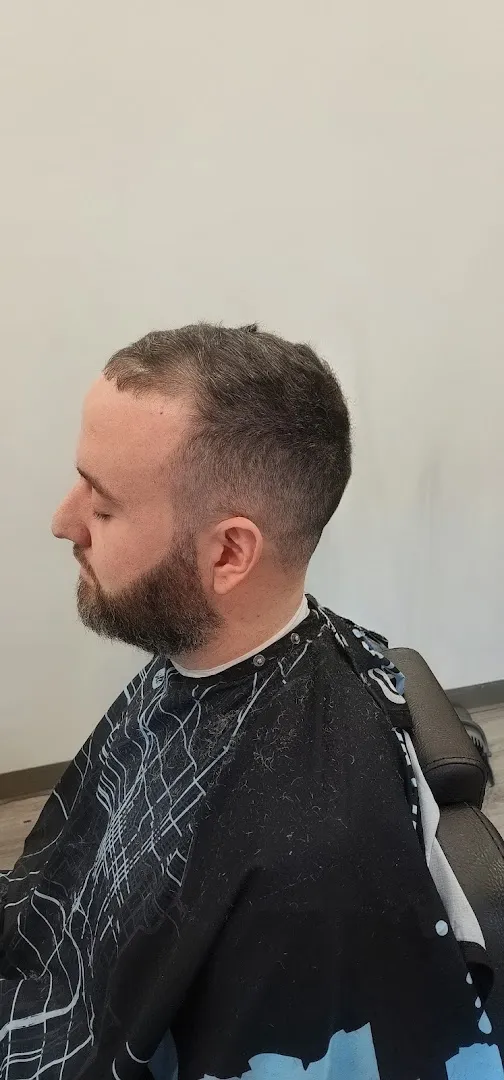 Clean skin fade with sponge curls