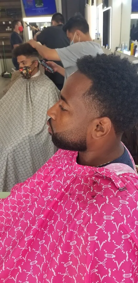 Beard trim in progress at Johnnie J's Barber Studio