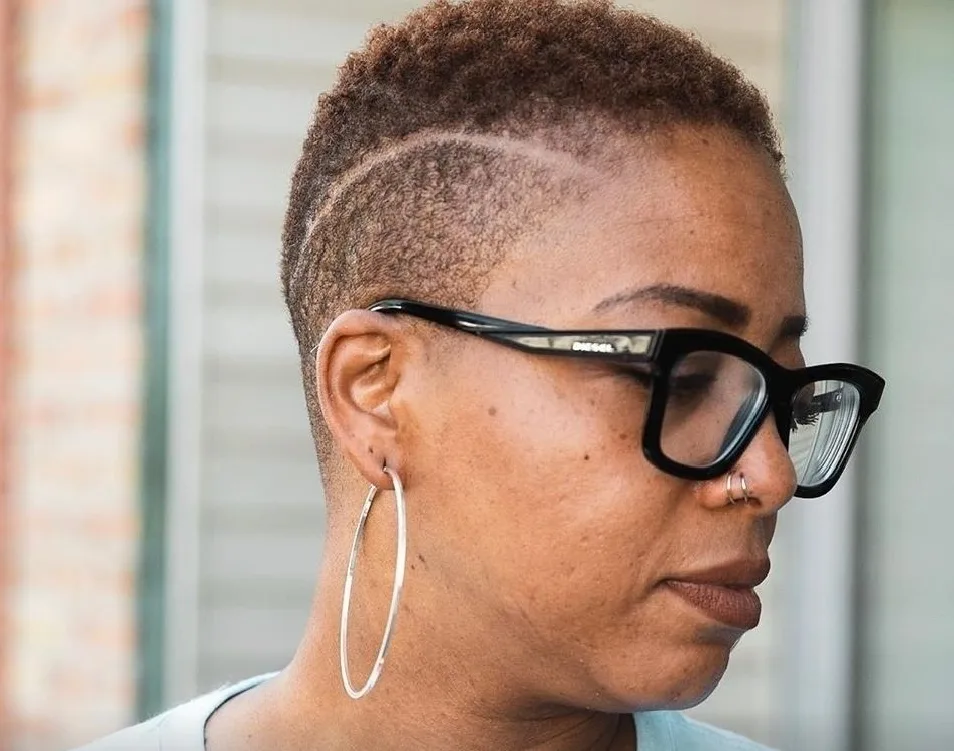 Short natural cut with clean line work — all textures welcome
